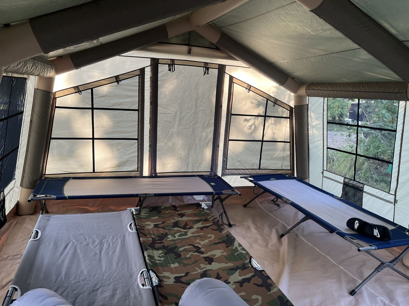 Interior of the K1 Outdoors tent set up with camping cots